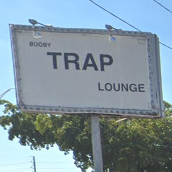 logo for The Trap Lounge